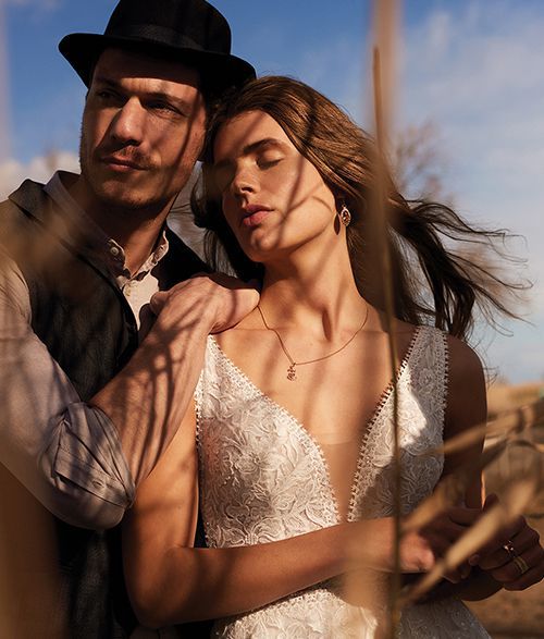 Lillian West Style 66170 Plunging V-Neck A-Line Gown with Open Back